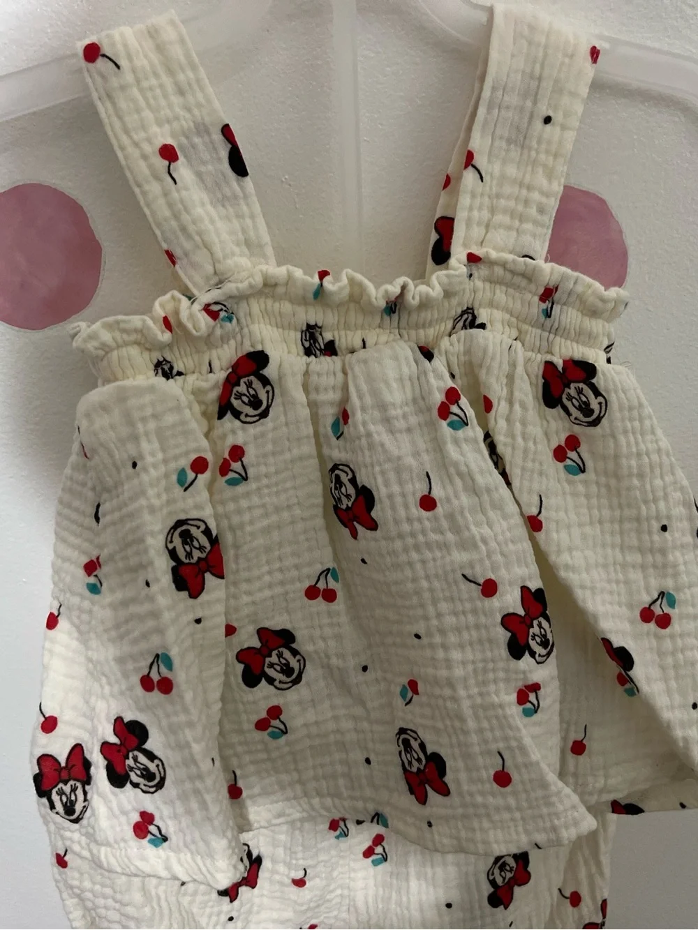 Disney Cream Baby Romper with Red and Black Minnie Faces and Teal Accents